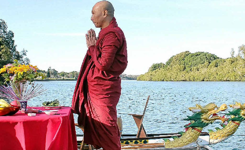 Barry and Edna receive their blessing from the Buddhist monk at the Dragon Boat Come and Try Day. Photo: Contributed Barry and Edna receive their blessing from the Buddhist monk at the Dragon Boat Come and Try Day. Photo: Contributed
